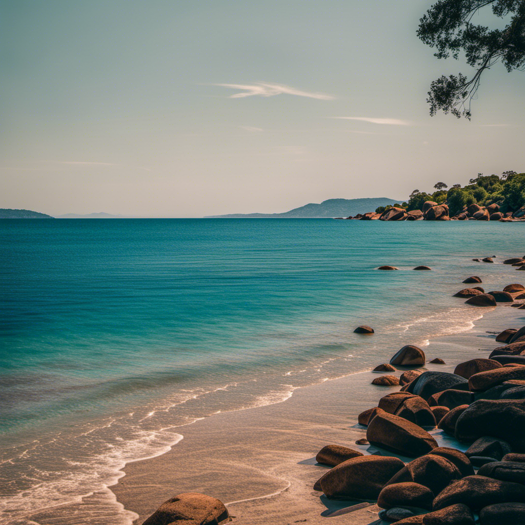 An image showcasing the azure waters of Le Lavandou's pristine beaches, juxtaposed with Lake Kariba's vast expanse dotted with lush islands