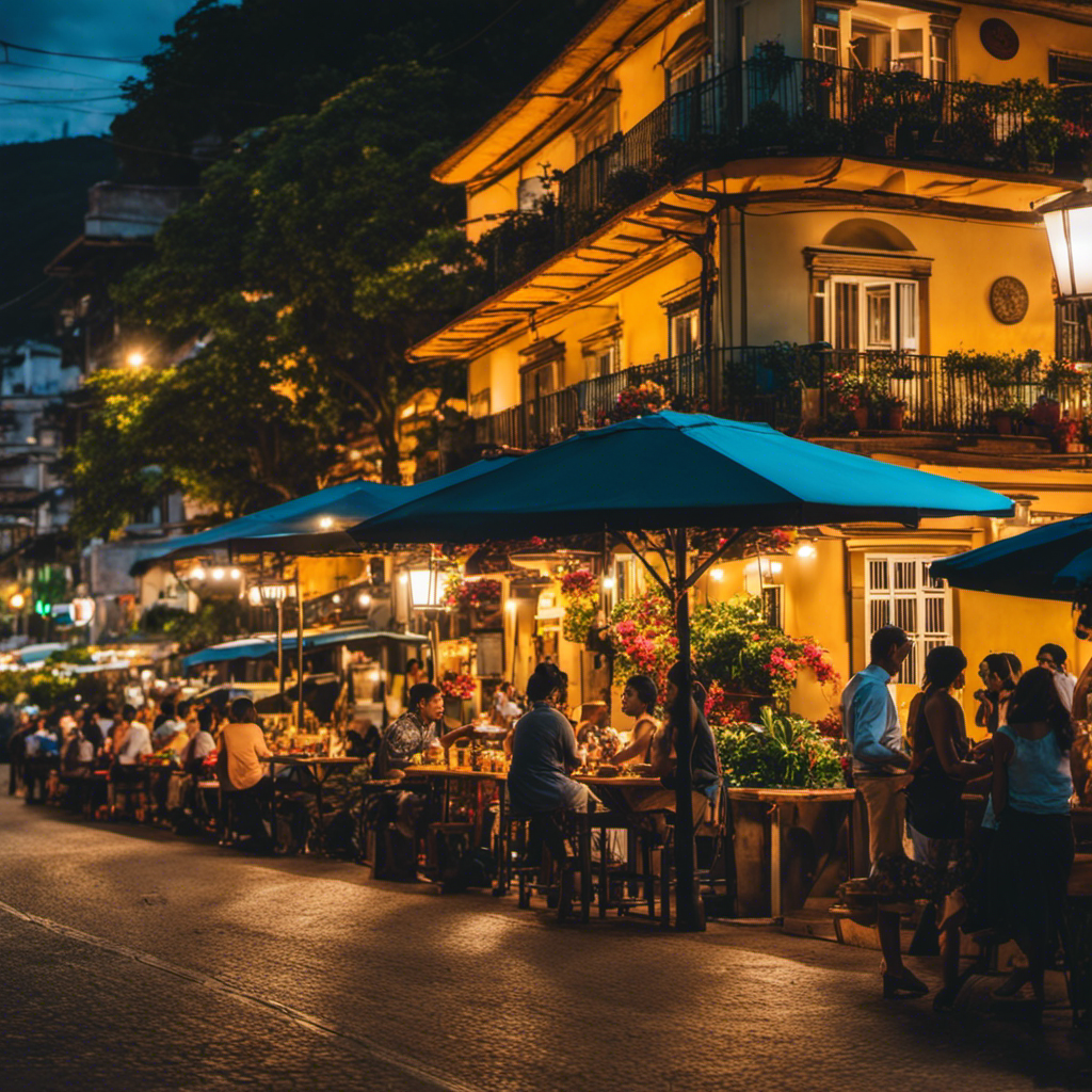 An image capturing the lively streets of Medellin at dusk: Colorful colonial buildings adorned with blooming flower baskets, locals enjoying al fresco dining, savoring the city's mouthwatering empanadas and refreshing glasses of lulo juice