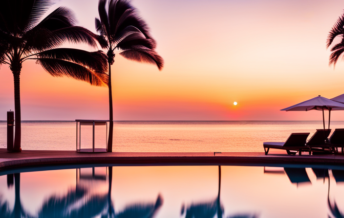 a breathtaking infinity pool overlooking a serene coastline, fringed with palm trees, as the sun sets behind a luxurious hotel