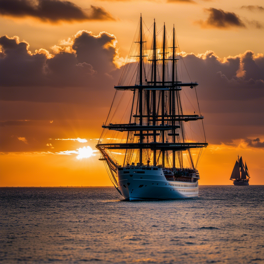 the awe-inspiring moment when the Discovery Princess gracefully sails through crystal-clear Caribbean waters, her regal silhouette adorned with towering masts, billowing sails, and shimmering lights, as the vibrant sunset casts a warm, golden glow upon her proud hull