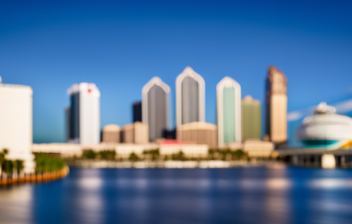 An image capturing the captivating view of Tampa's bustling port, adorned with gleaming cruise ships majestically docked along Channelside Drive