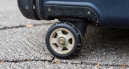 suitcase wheel wear prevention