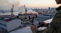 Ukrainian Drone Attack On Russian Port City Kills Four. Fire Reported At Port.